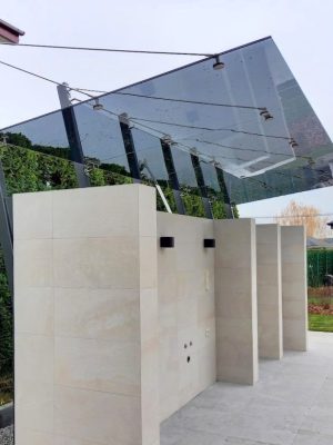 Glass canopy over barbecue