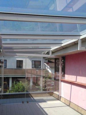 Glass canopy with drainage