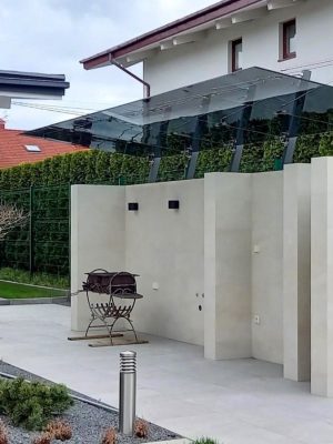 Glass canopy over barbecue