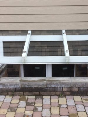 Glass canopy over basement light well