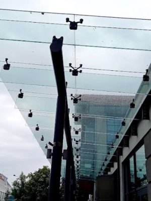 Glass canopy on glass beams